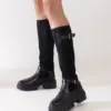 Wsuwané černé kozačky s elastickým svrškem Miste.