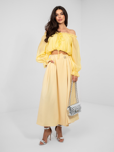 Pastelově žlutá elegantní midi sukně s kapsami – NARALIA